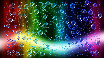 Image showing Cheerful colors of raindrops on the window