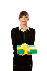 Image showing green box with yellow bow as a gift