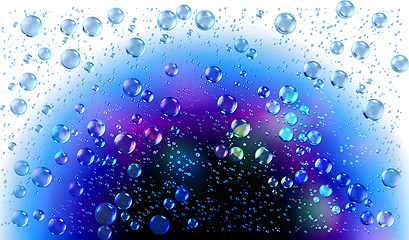 Image showing Cheerful colors of raindrops on the window