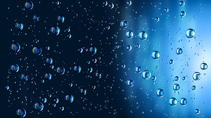 Image showing motion blue water drops in the rain
