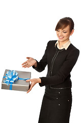 Image showing Silver box with blue bow as a present