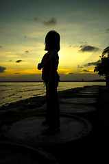 Image showing Silhouette of a Kid with Sunset