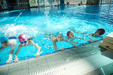 Image showing happy childrens at swimming pool