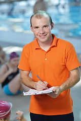 Image showing happy childrens at swimming pool