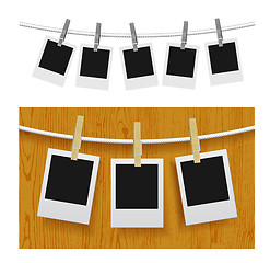Image showing Photo frames with pins on rope