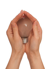 Image showing lamp in the womans hand