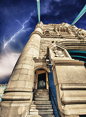 Image showing Storm over the powerful structure of Tower Bridge in London