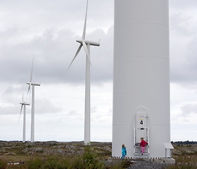 Image showing Children looking at windmills
