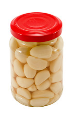 Image showing Glass jar pot of preserved garlic isolated 