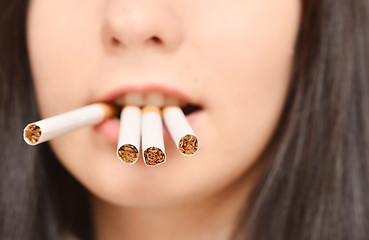 Image showing woman with cigarettes