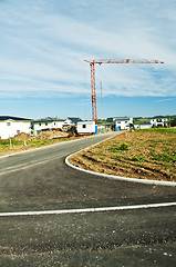 Image showing houses estate with crane
