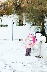 Image showing grandmother with the grand daughter in autumn park