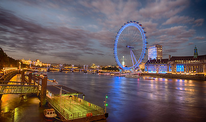 Image showing London skyline across the Thames from Westminster Bridge with bl