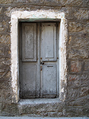 Image showing mediterranean wood door and stone wall, Corsica, mountain villag