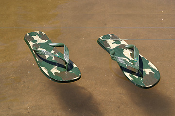 Image showing beach slippers near the beach, summer, bathing
