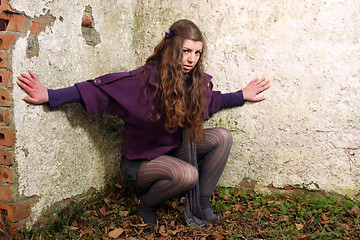 Image showing  beautiful woman in an autumn park 