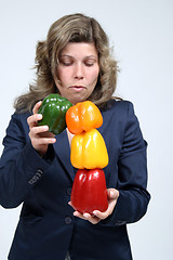 Image showing woman with colored peppers, healthy food photo