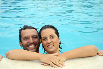 Image showing Loving swimmingpool smiling couple