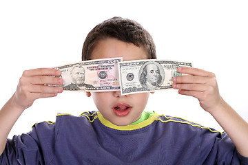 Image showing boy blinded by money, studio photo