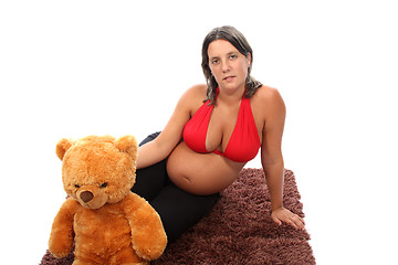 Image showing beautiful pregnant woman with beautiful belly and teddy bear