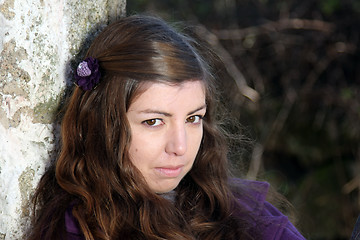 Image showing  beautiful woman in an autumn park 