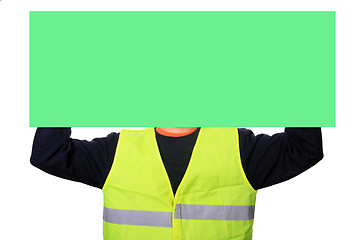 Image showing Portrait of a worker with green publicity board