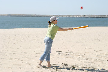 Image showing playing baseball on the beach, sports photo