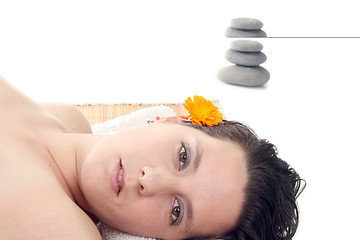 Image showing attractive woman in a relaxing treatment spa