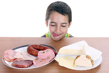 Image showing hungry boy for cheese and sausage, food photo