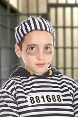 Image showing A view of a sad prisoner in jail 