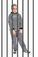 Image showing A view of a sad prisoner in jail 