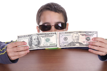 Image showing boy blinded by money, studio photo