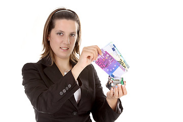 Image showing hand holding a euro bill, business studio photo