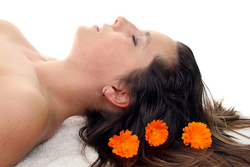 Image showing attractive woman with hot stones treatment at a spa