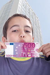 Image showing boy with euro bills, business studio photo