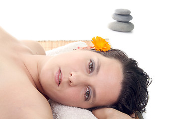 Image showing attractive woman with hot stones treatment at a spa