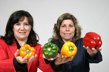 Image showing woman with colored peppers, healthy food photo