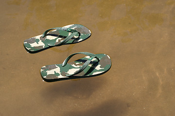 Image showing beach slippers near the beach, summer, bathing