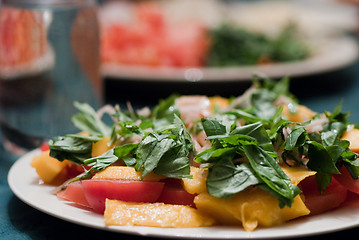 Image showing Green salad with mango and tomatoes