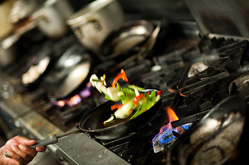 Image showing Tossing vegetables