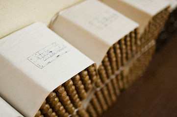 Image showing Cigars stacked for sale