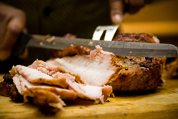 Image showing Cutting meat