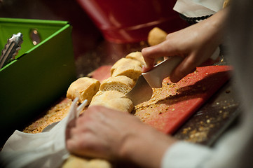 Image showing Slicing French bread