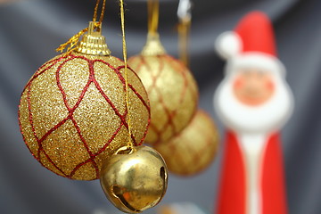 Image showing gold christmas globes