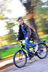 Image showing happy boy riding bike