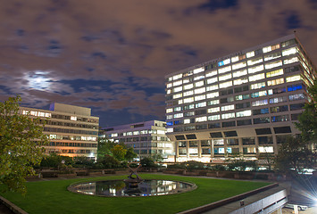 Image showing Buildings near Westminster Bridge illuminated at Dusk, London