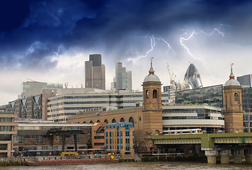 Image showing Storm over City of London, financial center and Canary Wharf at 