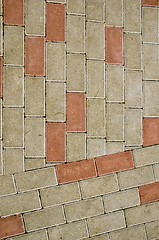 Image showing City sidewalk lined with small tile background 