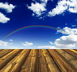 Image showing blue sky and wood floor background