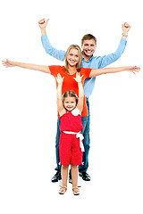 Image showing Fun loving family. Full length portrait